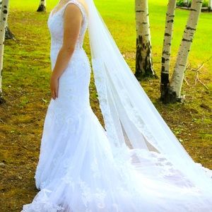 Wedding dress from blush boutique. Size 0 has been taken in